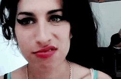 Adult Girl Making Meh Face  GIF