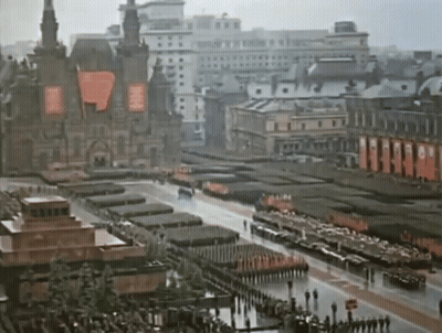 Aerial City With Buildings And People GIF
