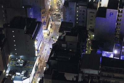 Aerial View City Night Building Says P GIF