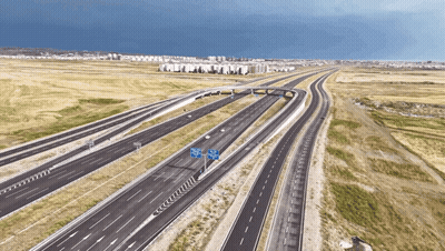 Aerial View Highway Intersection Blue Sign A GIF