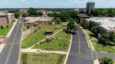Aerial View Of City With Buildings And Trees GIF