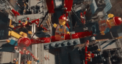 Aerial View of City With Lego Figures Flying Overhead