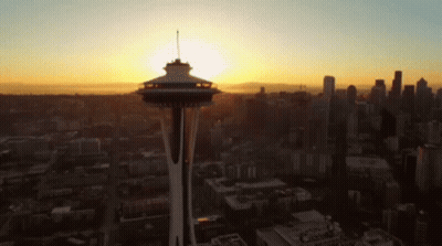 Aerial View Of City With Space Needle At Sunset GIF