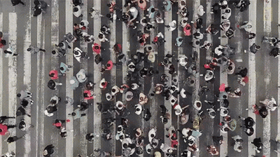 Aerial View Of Crowd Crossing Street GIF