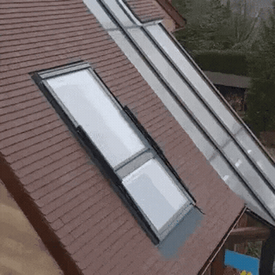 Aerial View Of Roof With Skylight And Gutter GIF