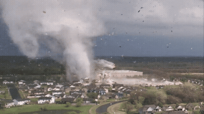 Aerial View Of Tornado Over Residential Neighborhood GIF