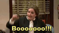 Aidy Bryant Booo Thumbs Down GIF