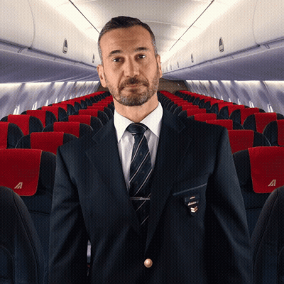Airplane Flying Through White Circle GIF