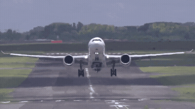 Airplane Taking Off With Red Tail Light GIF