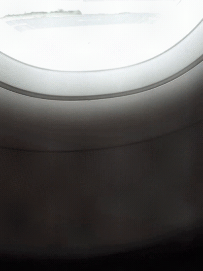 Airplane Window View Of Runway GIF