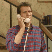 Al Bundy Saying Hello On Telephone GIF