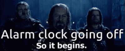 Alarm Clock Going Off With Three Men GIF