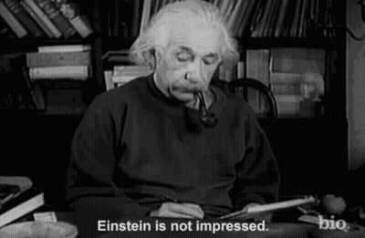 Albert Einstein Smoking Pipe At Desk GIF
