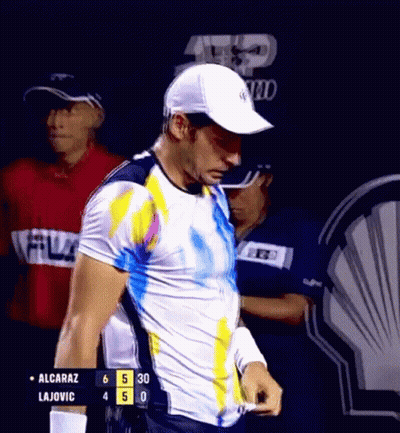 Alcaraz Lajovic Standing In Front Of Scoreboard GIF