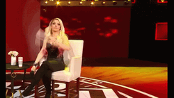 Alexa Bliss Throwing Papers GIF