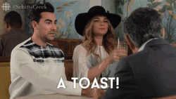 Alexis Rose Giving A Toast GIF