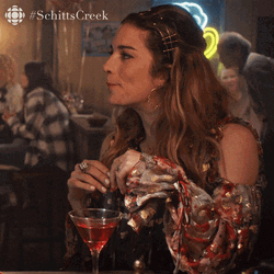 Alexis Rose Schitts Creek Flipping Hair GIF