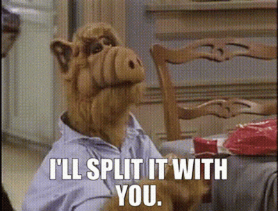 Alf From The Show Sits At A Table With A Cake And Says I 'Ll Split It With You GIF