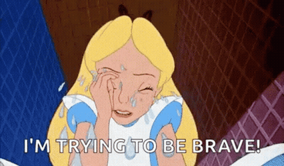 Alice From Alice In Wonderland Is Crying With Tears Running Down Her Face . GIF
