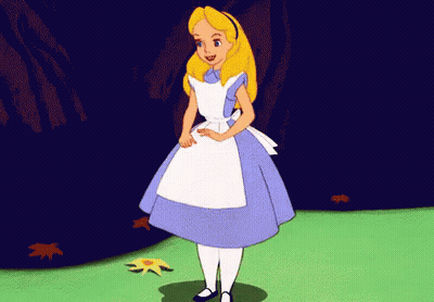 Alice From Alice In Wonderland Is Standing In A Field With Leaves On The Ground . GIF