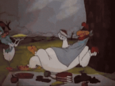 Alice In Wonderland Lying On Back On Picnic Blanket GIF