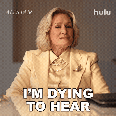 All's Fair Poster Woman In White Suit GIF