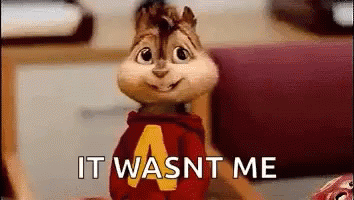 Alvin The Chipmunk From The Alvin And The Chipmunks Movie Is Sitting On A Couch And Smiling . GIF
