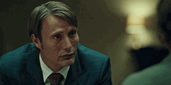 Amazing Sad Smiling Hannibal Mads Mekkelsen GIF