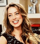 Amber Heard Delightfully Smiling GIF