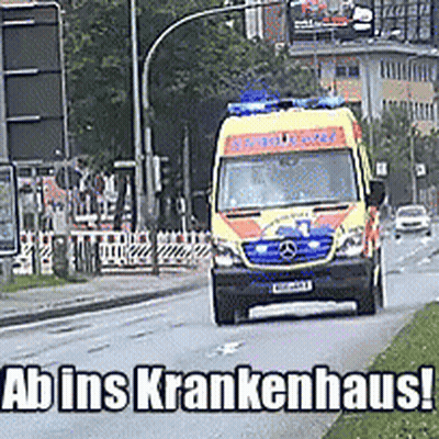 Ambulance Driving Down Street Ab Ins Krankenhaus GIF