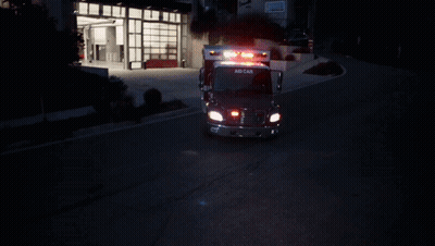 Ambulance With Aid Car On Front GIF