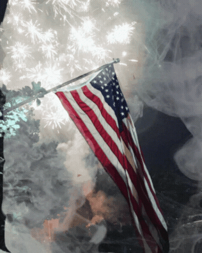 American Flag Flying Fireworks Display GIF