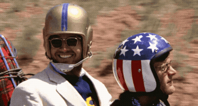 American Flag Helmet Man Smiling At Another Man GIF