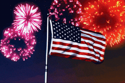 American Flag In Front Of Fireworks GIF