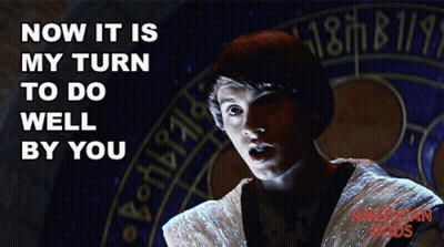 American Gods Poster Man In Front Of Circular Sign GIF