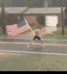 American Guy Holding Flag During Storm GIF