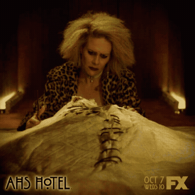 American Horror Story Hotel Woman Laying On Dead Body GIF