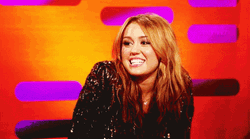 American Singer Miley Cyrus Awkward Smile GIF