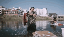 Amma Kanakku Doing Laundry In The River GIF