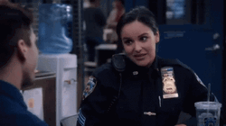 Amy Santiago Nervous Laugh GIF