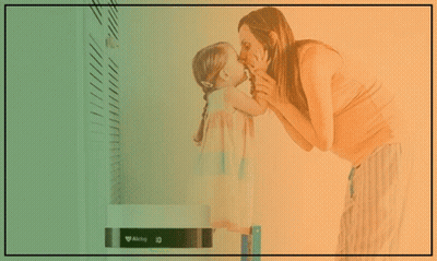 An Ad For An Air Purifier For Smoke Shows A Woman And Child Kissing GIF