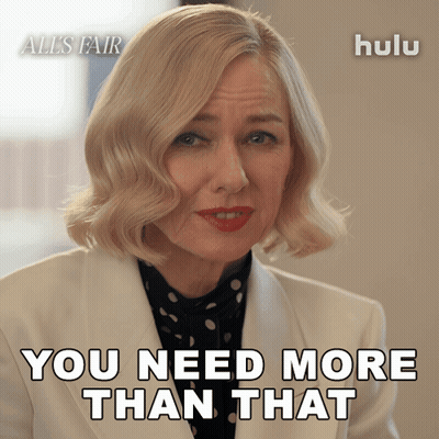 An Advertisement For All 'S Fair Shows A Woman In A White Suit GIF