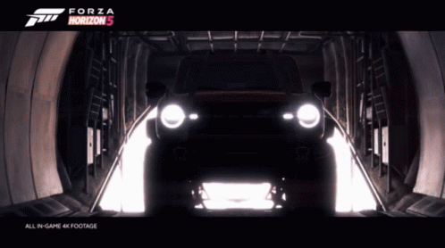 An Advertisement For Forza Horizon 5 Shows A Car In A Dark Tunnel GIF