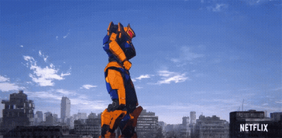 An Advertisement For Netflix Shows A Robot Standing In The Middle Of A City GIF