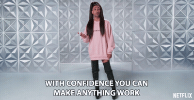 An Advertisement For Netflix Shows A Woman In A Pink Sweatshirt And Black Boots GIF