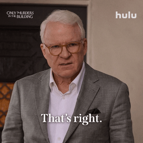 An Advertisement For Only Murders In The Building Shows A Man In A Suit GIF