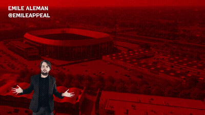An Advertisement For Robin Van Persie With A Man In Front Of A Large Stadium GIF