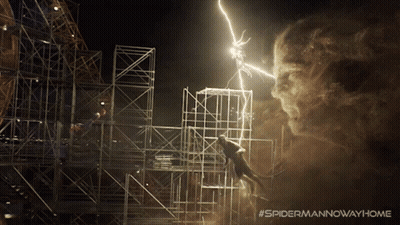 An Advertisement For Spider Man Now Way Home Shows A Man Being Struck By A Lightning Bolt GIF