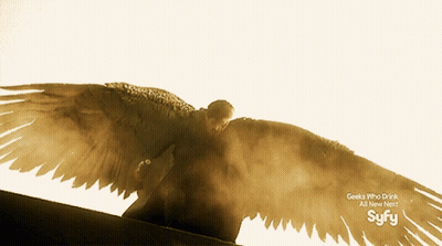 An Advertisement For Syfy Shows A Man With Wings Spread GIF