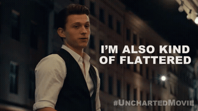 An Advertisement For The Uncharted Movie Shows A Man In A Suit GIF